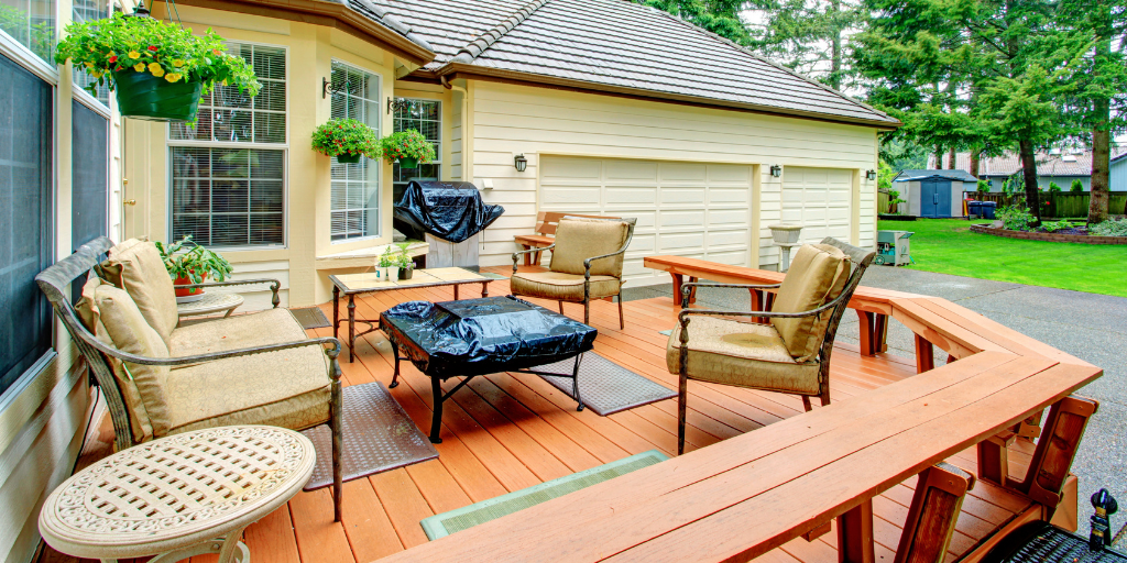 a backyard deck in the summer time