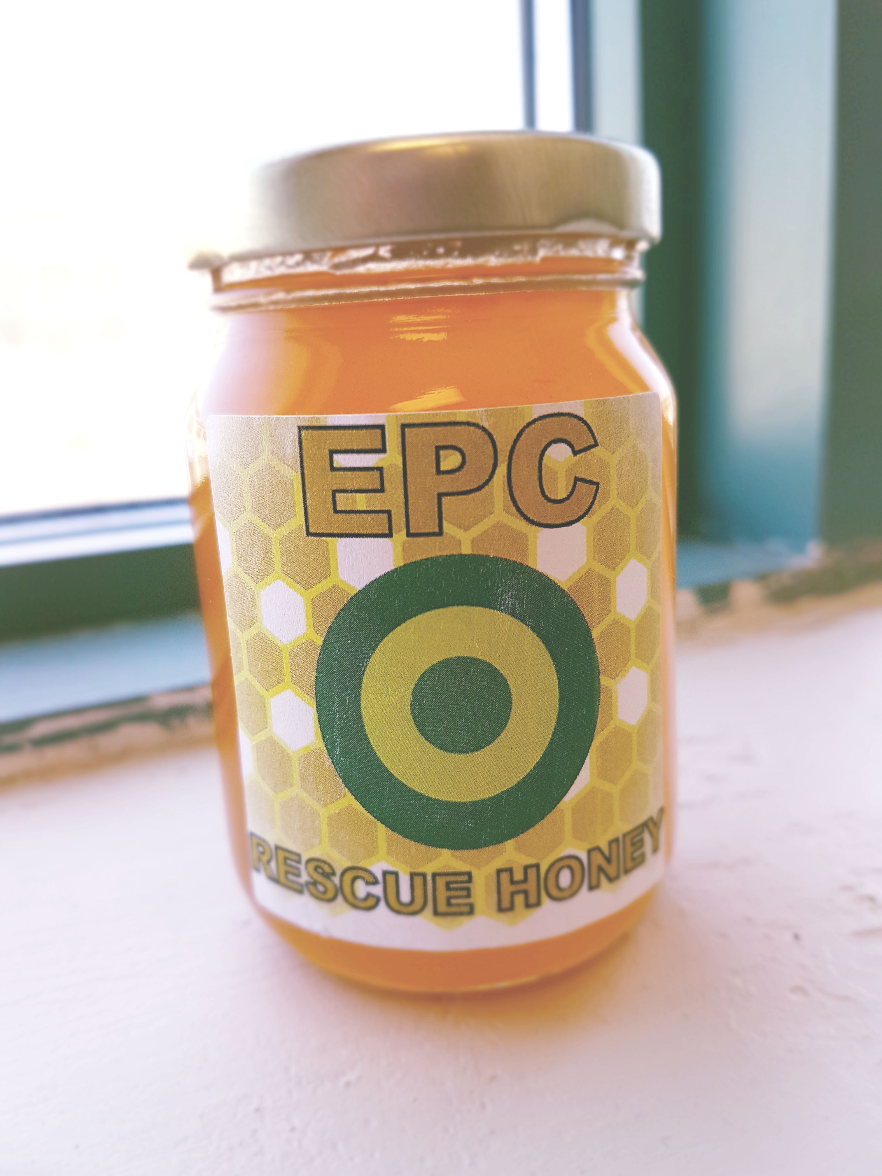 a jar of honey from environmental pest control
